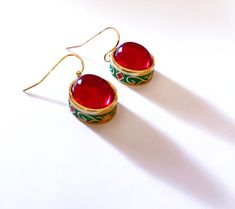 Golden plated Earrings Red Carnelian Gem. Coloured Cloisonne enameled. High quality.    Handmade ethnic antique design egyptian style ring Metal Type - 18k Gold plated Gem Colour - Red The earrings are delivered with a jewelry box.  Combined shipping! Ornate Red Cabochon Jewelry, Handmade Red Enamel Jewelry, Vintage Red Earrings For Festive Occasions, Traditional Red Enamel Jewelry, Vintage Red Hand Painted Jewelry, Red Round Enamel Earrings, Red Enamel Round Earrings, Hand Painted Red Elegant Earrings, Elegant Hand Painted Red Earrings