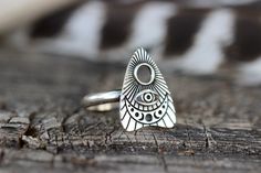 "This listing is for one bold and mesmerizing sterling silver celestial planchette ring that is elegant and edgy and unique! The planchette is beautifully detailed with moon phases, an All Seeing Eye, and radiant lines. These sturdy and solid statement rings make a great gift for any witchy woman (or man!) - Choose your ring size at checkout! - Planchette measures 19mm by 15mm. - Ring band is made from sturdy 9 gauge half round sterling silver wire. - Made to Order. Please check current processi Planchette Ring, Witch Ring, Moon Phase Ring, Witch Rings, Ring Moon, Celestial Ring, Raw Crystal Ring, Raw Stone Ring, Witch Jewelry