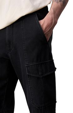 With an inky wash marked by hints of fading, these cargo pants cut from nonstretch cotton denim feature a roomy, relaxed fit and plenty of handy pockets. 31 1/2" inseam; 18" leg opening; 11" front rise; 16" back rise (size 29) Zip fly with button closure Front slant patch pockets; back welt pockets; cargo flap-patch pockets 100% cotton Machine wash, tumble dry Imported Relaxed Fit Washed Black Cargo Jeans With Multiple Pockets, Utility Style Washed Black Relaxed Fit Cargo Jeans, Washed Black Relaxed Fit Cargo Jeans, Relaxed Fit Denim Cargo Pants In Washed Black, Washed Black Cotton Cargo Jeans With Patch Pockets, Washed Black Relaxed Fit Jeans With Patch Pockets, Dark Wash Relaxed Fit Cargo Pants With Pockets, Relaxed Fit Washed Cargo Jeans With Tapered Leg, Relaxed Fit Tapered Leg Washed Cargo Jeans