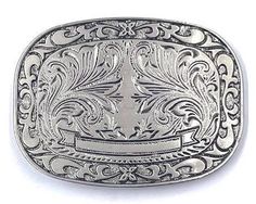 Old Silver rectangular western style belt buckle with art deco floral design  Made in USA size 3 5/8 by 2 5/8 inches fits 1.5" strap Silver Engraved Rectangular Belt Buckles, Rectangular Engraved Silver Belt Buckles, Silver Rectangular Engraved Belt Buckles, Rectangular Silver Engraved Belt Buckles, Silver Rectangular Belt Buckles For Formal Occasions, Western Antique Rectangular Belt Buckle, Western Antique Belt Buckles In Rectangular Shape, Western Style Rectangular Antique Belt Buckle, Vintage Silver Rectangular Belt Buckles