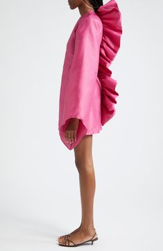 Bold ruffles bring lots of texture to the back of this statement-making cocktail dress made of subtly textured satin. Hidden back-zip closure Jewel neck Long sleeves 100% polyester Dry clean Made in Turkey Black Owned/Founded Elegant Spring Mini Dress For Fashion Events, Elegant Mini Dress For Spring Fashion Events, Pink Taffeta Cocktail Dress, Spring Silk Dresses For Fashion Events, Spring Taffeta Knee-length Dress, Spring Pleated Taffeta Dress, Spring Knee-length Taffeta Dress, Pleated Taffeta Dress For Spring, Glamorous Satin Mini Dress With Ruffles