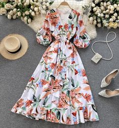 Floral Print V-neck Dress For Summer Brunch, V-neck Chiffon Maxi Dress With Print, Printed Chiffon V-neck Maxi Dress, Chic White V-neck Dress With Floral Print, Chic Floral Printed V-neck Dress, V-neck Chiffon Printed Dresses, Spring Floral Print V-neck Dress For Vacation, Floral Print Long Sleeve V-neck Dress For Brunch, White V-neck Dress For Spring Garden Party