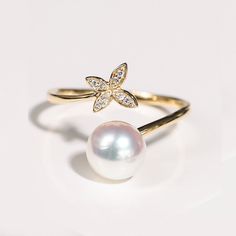 Akoya Pearl Rose Gold Butterfly Ring, Japan Pearl And Diamond Ring, Vintage Real Pearl Ring, Ivory Pearl, Pinkish Pearl, Dainty Promise Ring ✦PRODUCT DETAILS✦ → Main stone: Akoya Pearl 7.5-8.0mm → Side stone: Diamond 0.026ct ✦SPECIFICATIONS✦ MOISSANITE ✓ COLOR: D ✓ CLARITY: VVS1 ✓ CUT: EXCELLENT OR DIAMOND ✓ COLOR: F-G ✓ CLARITY: SI1-VS ABOUT US ♥ Our designer and craftsmen work to create and deliver the most refined pieces of jewelry to you. We carefully handpicked and sourced each gemstone to Fine Jewelry White Pearl Open Ring, White Pearl Open Ring Fine Jewelry, White Pearl Open Ring For Wedding, White Open Pearl Ring For Wedding, White Open Ring Pearl Ring For Wedding, Dainty White Flower Ring For Wedding, Delicate White Flower Ring For Wedding, Pearl White Open Ring Jewelry For Wedding, Pearl White Open Ring For Wedding