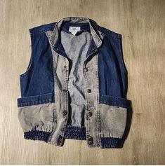 Vintage 1980s Palmettos denim vest  Great vintage condition  Size S NOTE : Pre-Owned/Vintage items sometimes have some minor Scuff Marks, Scratches, spots, Paint Loss or Discoloration, that comes with the age of the item. Sometimes color may show up differently on picture.  Items are sold as is. Grunge Cotton Denim Vest With Pockets, Retro Denim Vest With Pockets For Fall, Retro Dark Wash Cotton Denim Vest, Retro Vest With Pockets, Retro Sleeveless Denim Vest With Pockets, Retro Vest With Pockets For Spring, Retro Medium Wash Cotton Denim Vest, Retro Style Medium Wash Denim Vest, Retro Cotton Denim Vest For Spring