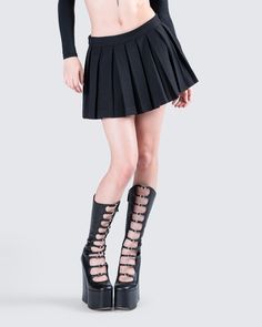 Serve looks with this staple piece mini skirt 🖤 Made from stretch suiting fabric, and complete with a pleated design for a timeless and versatile look that will turn any day into a good outfit day 😌 Fitted School Uniform Mini Skirt For Fall, Punk Style Fitted Short Skirt, Punk Pleated Mini Skirt, Edgy Pleated Skort For Fall, Fitted Mini Skirt For School Uniform, Edgy Pleated Mini Skirt, Edgy Pleated Skort For Summer, Party Mini Skirt With Pleated Hem, Edgy Fitted Skort For Fall