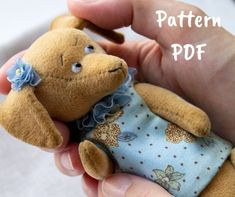 a person holding a stuffed animal in their hand with the caption pattern pdf