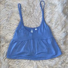 Babydoll Tank New, Never Worn (Nwot) Size Xs Blue Cami Crop Top For Vacation, Blue Cami Crop Top For Beach, Blue Cami Crop Top For The Beach, Blue Summer Crop Top Tank, Blue Crop Top For Summer Loungewear, Blue Tops With Built-in Bra For Summer, Light Blue Summer Top With Built-in Bra, Blue Seamless Tops For Vacation, Seamless Blue Tops For Vacation