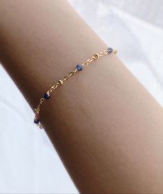 * DETAILS* - AAA+ Burma Blue Sapphire Faceted Beads 2mm - 14k Gold Filled Chain - 14k Gold Filled Spring Ring Clasp ✨ All components are 14k Gold Filled. 👉🏻 How to measure 1. Use a string to mark the spot you would like your bracelet. (⭐️remember to add some space for a loose fit) 2. Lay the string flat and measure the string's length with a ruler to get your final length. 👉🏻 You may also like the matching necklace. Please check here. https://www.etsy.com/JinnysJewelryBySeJin/listing/8715687 Delicate Beaded Bracelet With Adjustable Chain For Gift, Adjustable Beaded Bracelet With Delicate Chain For Gift, Dainty Beaded Bangle Bracelets, Blue Dainty Birthstone Bracelets, Delicate Blue Bracelets For Everyday, Dainty Hypoallergenic Rosary Bracelet Gift, Dainty Everyday Crystal Bracelet, Dainty Bracelets For Birthday Gift, Dainty Gemstone 14k Gold Filled Bracelets