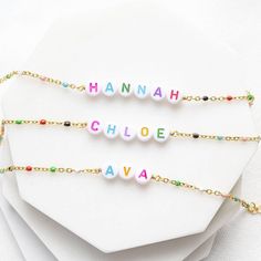 A colourful rainbow enamel bracelet with a personalised name or word. Add a pop of colour to every day with this gorgous handmade bracelet. Personalised with the name or word of your choice in vibrant multi coloured acrylic letter beads mounted onto a dainty but sturdy gold plated enamel beaded chain. This bracelet will definitely bring a smile to the face of whoever wears it. A perfect personalised gift for her or a self indulgent treat. Available in 2 sizes, and suitable for both adults and ch Personalized Multicolor Beaded Bracelets With Custom Name, Personalized Multicolor Beaded Bracelet With Custom Name, Personalized Custom Name Multicolor Beaded Bracelets, Personalized Multicolor Custom Name Beaded Bracelets, Playful Personalized Name Bracelet, Custom Name Bracelet For Friendship, Multicolor Bracelets With Custom Name For Personalized Gift, Playful Custom Name Bracelet As Personalized Gift, Multicolor Custom Name Bracelet For Personalized Gift