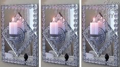 two mirrors that have candles in them