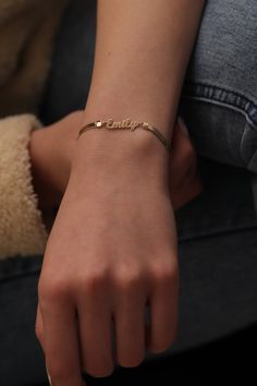 "14k Gold Herringbone Name Bracelet or Anklet /Handmade Herringbone Name Chain Bracelet or Anklet Available in Gold, Rose Gold and White Gold ** Please leave your Name and Font Type in Personalization box. ** The name Emily is Script Mt Bold Font ❥ ITEM DETAILS ---> Gold Color of Choice : Yellow Gold, Rose Gold, White Gold ---> Material : 14k ( 585 ) Real Gold. It is Not Gold Filled or Gold Plated ---> Made to order ---> The width of Chain: 3.00 mm ---> Chain Style: Herringbone Ch Gold Name Chain Bracelet, Gold Handmade Minimalist Name Bracelet, Gold Minimalist Handmade Name Bracelet, Handmade Minimalist Gold Name Bracelet, Gold Name Bracelet As A Gift, Minimalist Handmade Gold Name Bracelet, Gold Name Bracelet With Strap As A Gift, Gold Name Bracelets For Friendship, Dainty Gold Name Bracelet For Friendship