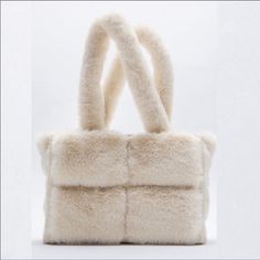 Beautiful Faux Fur Tote Bag From Zara In Ecru. New, Never Worn. Last Photo Is Of The Actual Tote :) Faux Fur Exterior. Shoulder Straps. Lined Interior With Pocket. Zipper Closure. Height X Length X Width: 9.8 X13.2 X 5.3 Inches (25 X 33.5 X 13.5 Cm) Fur Tote Bag, Faux Fur Purse, Bag Zara, Fur Purse, Fur Bag, Zara Bags, Pink Tote Bags, Evening Purse, Pretty Bags