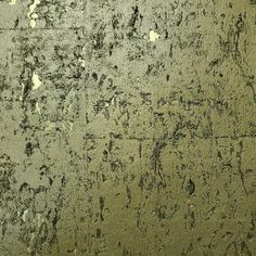 the surface of an old gold colored metal plate