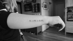 a woman with a tattoo on her arm that says, do what is inside