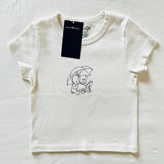 Bnwt Brandy Melville/John Galt Angel Baby Cherub Umbrella Teddy Bear Book Ashlyn Graphic T-Shirt Thick Cotton 16.5 X 13 Cute Brandy Melville Outfits, Brandy Melville Outfits, Angel Shirt, Teddy Bear Clothes, John Galt, Angel Baby, Bear Shirt, Brandy Melville Tops, Baby Angel