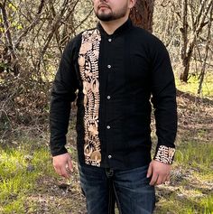 This Guayabera Shirt is a Traditional Mexican Shirt that never goes out of style. It is Stylish, Fresh and Comfortable. This Elegant Collared shirt is perfect for everyday use, Vacation and or any Special occasion. Black Long sleeve with Gold embroidery Stripe detail and on one of the cuffs. - Made in Mexico  We are not responsible for Stolen, late or Lost packages due to mail carriers. Message us if you have any questions.  * More Guayaberas styles Avaible click links to view. https://www.etsy.com/CositasBonitasByAri/listing/1429673383/guayabera-men-long-sleeve-mexican-shirt?utm_source=Copy&utm_medium=ListingManager&utm_campaign=Share&utm_term=so.lmsm&share_time=1677962341769 https://www.etsy.com/CositasBonitasByAri/listing/1416914002/guayabera-men-long-sleeve-mexican-shirt?utm_source=Cop Traditional Fitted Shirt With Buttons, Traditional Black Long Sleeve Shirt, Traditional Long Sleeve Black Shirt, Traditional Black Tops With Buttons, Traditional Fitted Long Sleeve Shirt, Formal Long Sleeve Tops For Festivals, Mexican Wedding Party, Traditional Mexican Shirts, Mexican Shirt