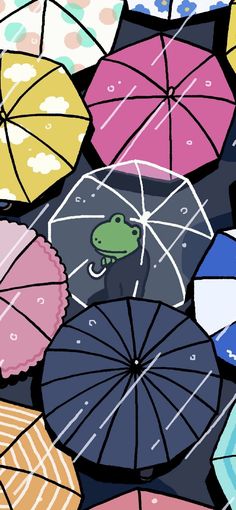 many colorful umbrellas with a frog on them