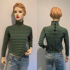 Early 1970's Vintage Shirt ~ Olive Green And Blue Striped Shirt, Nylon, Long Sleeves, Zips Up The Back, Very Good Condition, Size Small It has a tiny mend under one arm,  where the thread came undone.  it was mended now it's great. .   I will be mailing this Priority Mail.   Measurements  Bust ~ 36  Inch  Waist ~ 34 Inch Shoulder To Shoulder ~ 15 Inch Sleeve ~ 18 Inch Length ~  20 Inch Retro Stretch Long Sleeve Tops, Retro Fitted Tops For Fall, Fitted Retro Tops For Fall, Retro Blue Tops For Fall, Retro Stretch Top For Fall, Blue Retro Tops For Fall, Blue Retro Fall Tops, 1970s Fitted Long Sleeve Tops, Olive Green And Blue