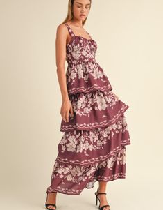 Floral print sleeveless ruched bust tiered maxi dress. Lining. Floral Print Tiered Sundress, Tiered Maxi Dress With Smocked Bodice For Garden Party, Sleeveless Floral Print Tiered Dress For Garden Party, Sleeveless Tiered Dress With Floral Print For Garden Party, Tiered Ruched Maxi Dress For Garden Party, Floral Print Tiered Maxi Sundress, Floral Print Tiered Sundress Maxi Dress, Sleeveless Floral Print Tiered Dress For Vacation, Sleeveless Tiered Dress With Floral Print For Vacation