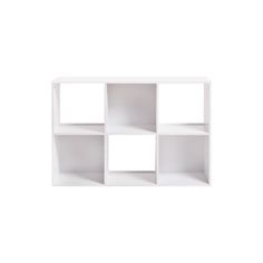 a white shelf with four sections on each side