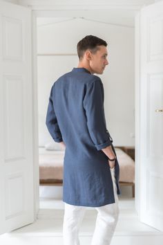 "A classic style redefined with modern styling, we created a linen tunic for men to fill that gap in your everyday wardrobe. The linen shirts are breathable and durable to provide maximum comfort, and they've kept it simple with roll-up sleeves and button-up closure. Step out in style no matter the occasion with a little help from our signature linen tunic. Handmade by masters of their craft in Lithuanian, where skills have been passed down for generations, your wardrobe's latest addition is sur Spring Linen Tunic Kurta, Relaxed Fit Long Sleeve Linen Kurta, Casual Linen Kurta With Relaxed Fit, Casual Linen Kurta For Summer, Casual Linen Kurta Tunic, Casual Linen Tunic Kurta, Summer Linen Kurta Tunic, Summer Linen Tunic Kurta, Summer Linen Kurta With Relaxed Fit