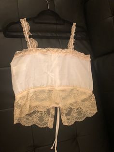 Gorgeous JC Penny Vintage lingerie tank. Excellent condition. Still trying to determine year. White Camisole With Contrast Lace, White Camisole With Contrast Lace For Summer, White Lace Contrast Camisole, White Contrast Lace Camisole, White Contrast Lace Camisole For Summer, White Contrast Lace Cami Camisole, Daywear Camisole With Contrast Lace And Spaghetti Straps, Summer Sleeveless Camisole With Contrast Lace, Sleeveless Summer Camisole With Contrast Lace