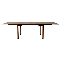 a wooden table with two legs and a long rectangular dining table in the middle, against a white background