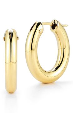 Lightweight and incredibly versatile, these sculptural hoop earrings are finely crafted from gleaming 18-karat gold. Style Name:Roberto Coin Oval Hoop Earrings. Style Number: 6095141. Available in stores. Timeless Oval Hoop Earrings With Polished Finish, Fine Jewelry Oval Hoop Earrings With Polished Finish, Oval Polished Hoop Earrings Fine Jewelry, Oval Hoop Earrings With Polished Finish, Luxury Oval Huggie Earrings For Formal Occasions, Modern Oval Huggie Earrings With Polished Finish, Luxury Small Hoop Earrings With Polished Finish, Luxury Small Hoop Earrings With Shiny Finish, Oval Luxury Hoop Earrings For Everyday