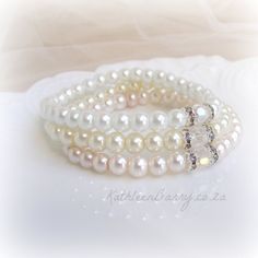 Pearl Stacking Bracelets  Bridesmaid by KathleenBarryJewelry, #bride #weddingjewelry #bridalbracelet #blush #blushpink #ivory #pearlbracelet Crystal Pearl Earrings, Gift For Bridesmaids, Stacking Bracelets, Pink Ivory, Wedding Jewelry Bracelets, Bridesmaid Bracelet, Bridal Bracelet, Small Earrings, Pink Bracelet