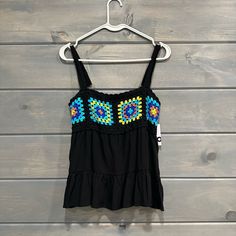 Flowy Black Tank Top With Adjustable Straps. Super Cute Crochet Detail Across Chest. Women’s Size Medium. New With Tags. Black Cotton Beach Vest, Fitted Multicolor Beach Vest, Stretch Vest For Vacation, Black Vest For Beach In Summer, Stretch Camisole Vest For Beach, Trendy Sleeveless Crochet Top For Beach Season, Sleeveless Trendy Crochet Top For Beach Season, Black Summer Camisole For Beach, Summer Cami Vest For Beach