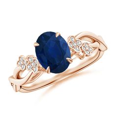 an oval blue sapphire and diamond ring in rose gold