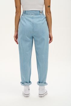 Addison Is Our High Waist Trousers With Elasticated Back And Tapered Leg. Referred To As “Magic Trousers” By Those With Big Hips And Withoutavailable Here In Light Wash Blue Denim! Our Fit High Waisted With A Wide Waistband To Sit Over The Waist, Extra Ease With Elasticated Side Panels Pleated Front To Allow Loose Fitting Over The Hips Tapered Full Length Leg With Room To Roll Deep Side Pockets The Fabric Made From 100% Gots Certified Organic Cotton Denim The Fabric Is Soft, Breathable And Durab Trendy Tapered Bottoms For Spring, Tapered High Waist Jeans For Spring, Denim Blue Mom Fit Bottoms For Spring, Medium Wash Mom Fit Bottoms For Spring, Spring Medium Wash Mom Fit Bottoms, Spring Denim Blue Mom Fit Bottoms, Spring Tapered Jeans With Pockets, Spring Tapered Jeans, Denim Blue Mom Fit Denim Pants