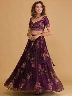 Introducing the stunning wine floral digital organza festival wear lehenga choli from Ethnic Plus! This exquisite ensemble is crafted with precision and attention to detail, making it the perfect choice for weddings and festive occasions like mehendi ceremonies. Let's delve into the benefits and key features of this gorgeous outfit.
The wine color of this lehenga choli exudes sophistication and adds a touch of glamour to your look. It is a timeless and elegant choice for any special event.This s Designer Floral Print Organza Choli, Floral Print Organza Sharara For Navratri, Floral Organza Sharara For Navratri, Floral Print Organza Lehenga With Traditional Drape, Navratri Floral Print Organza Lehenga, Semi-stitched Party Lehenga With Floral Print, Festive Organza Lehenga With Floral Print, Party Semi-stitched Lehenga With Floral Print, Festival Organza Choli With Floral Print