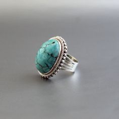 Description Turquoise Ring, Solid Sterling Silver Ring, Handmade Jewelry, Oval Turquoise Ring, Birthstone Ring, Statement, Natural, Ring For Her✦Gemstone : Turquoise *may contain natural inclusions inside the stone ✦Stone Shape : Oval Cabochon ✦Gemstone: Turquoise ✦Metal: 925 Sterling Silver Natural stones may vary slightly in shape, size and color.Handmade ItemYou will receive the same piece as in the picture or identical. Since all gemstones are different from each other, I cannot guarantee that the gemstone you see above will still be available.. But I assure you will get same quality piece as shown in the above picture.# Your order will be dispatch within 3-5 working days after receiving order# Items will be sent via registered airmail and take approx. 15-20 days to arrive. # Express m Adjustable Turquoise Ring With Stones, Adjustable Turquoise Ring With Gemstones, Turquoise Ring With Natural Stones, Sterling Silver Rings With Turquoise Natural Stones, Bohemian Style Emerald-colored Ring, Sterling Silver Turquoise Ring With Stones, Sterling Silver Turquoise Ring With Stone Setting, Turquoise Sterling Silver Rings With Stone Setting, Oval Turquoise Ring With Stones