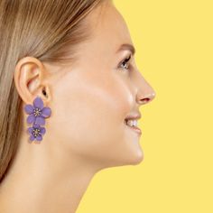 Introducing our exquisitely crafted Lavender Floral Enamel Earrings, a delightful pair designed for the floral enthusiast in you. These earrings are a perfect blend of elegance and whimsy, with intricate floral details and golden pistils that add a touch of sophistication to any ensemble. Crafted with meticulous attention to detail, these earrings showcase the beauty of lavender flowers in full bloom, capturing their delicate charm and grace. The enamel work brings the flowers to life, adding a Spring Purple Flower Earrings For Pierced Ears, Purple Flower-shaped Earrings For Spring, Spring Flower-shaped Purple Earrings, Purple Earrings For Spring, Purple Flower Earrings For Spring Gift, Purple Flower Shaped Jewelry For Spring, Lavender Flower-shaped Earrings For Gifts, Purple Flower Shaped Jewelry With Flower Decoration, Elegant Lavender Flower Earrings For Gift