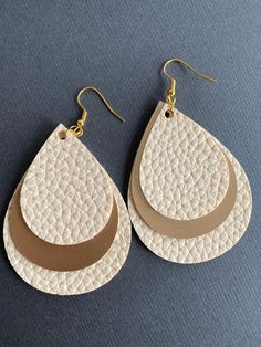 Gold and Cream Faux Leather Earring - Etsy Adjustable Nickel-free Beige Earrings, Chic Beige Dangle Jewelry, Cream Dangle Earrings Nickel Free, Cream Teardrop Earrings For Gift, Nickel Free Cream Dangle Earrings, Adjustable Cream Drop Earrings, Nickel-free Beige Dangle Earrings, Beige Nickel Free Dangle Earrings, Beige Dangle Earrings For Everyday