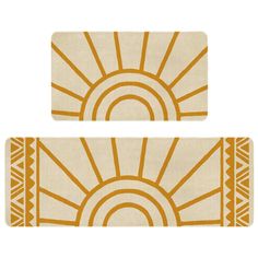 two placemats with an orange and white design on the top one has a sun in it