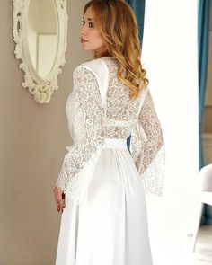 white v-neck satin long bridal robe with lace sleeves V-neck Lace Gown With Lace Trim, Long Sleeve Delicate Lace Wedding Night Dress, Lace Patchwork Gown For Wedding Night, Long Sleeve Delicate Lace Dress For Wedding Night, Long Sleeve Lace Gown For Wedding Night, Lace Long Sleeve Gown For Wedding Night, White Long Gown With Lace Trim, V-neck Lace Patchwork Dress For Wedding Night, White Long-sleeved Robe For Brides