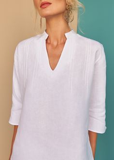 This Nyda tunic with textured pin-tuck details works a dream over your swim suit for lunch style with our Laura shorts or skin tight jeans for a beach side stroll. - 100% Italian "Masters of Linen"Pre-shrunkSoftened White Italian, Beach Side, Asymmetric Dress, Linen Tunic, Clothing Manufacturer, The Swing, Linen Top, Pin Tucks, Swim Suit