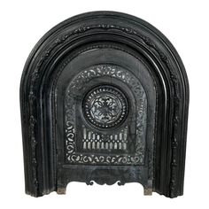 an old fireplace with ornate carvings on the front and back sides, isolated against a white background