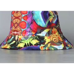 Colorful Bucket Hat. Os. Blue With Multicolored Feather Florets. New In Bag. 100% Polyester. Foldable. Reversible To Black Retro Multicolor Summer Hats, Trendy Red Festival Hat, Trendy Adjustable Multicolor Hats, Retro Multicolor Bucket Hat For Summer, Trendy Multicolor Bucket Hat For Summer, Trendy Multicolor Bucket Hat For Spring, Trendy Multicolor Hat For Festivals, Trendy Multicolor Festival Hat, Trendy Multicolor Cap