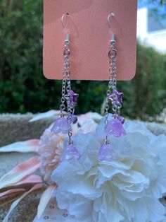 Cute Hypoallergenic Flower-shaped Jewelry, Trendy Silver Flower Earrings, Purple Dangle Flower Earrings For Pierced Ears, Cute Silver Flower Jewelry, Cute Silver Flower Earrings, Purple Flower-shaped Whimsical Jewelry, Cute Flower Shaped Jewelry For Gifts, Cute Flower-shaped Jewelry For Gifts, Cute Flower Shaped Jewelry Gift