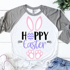 a shirt with the words happy easter on it and an image of a bunny's paw