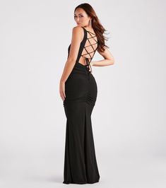 Slinky and smooth knit fabric offer a form-hugging fit on the Evania formal dress - an instant crowd-pleaser at weddings or banquets! She features a sleeveless square neck, tank shoulder straps, an eye-catching lace-up back with tie closure, and side, and back ruched seams to accentuate your figure along her mermaid silhouette with a floor-length hem. The formal dress is composed of a smooth knit-lined fabric with a moderate stretch. Complete the look with a box clutch and earrings.Fit & Fea Fitted Gala Gown With Lace-up Back, Fitted Lace-up Back Gown For Gala, Fitted Gown With Lace-up Back For Gala, Fitted Lace-up Back Evening Dress For Prom, Fitted Formal Gown With Lace-up Back, Elegant Fitted Gown With Lace-up Back, Fitted Mermaid Dress With Corset Back For Party, Fitted Maxi Dress With Ruched Back For Gala, Formal Evening Dress With Lace-up Back For Prom