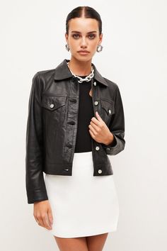 Perhaps the perfect leather jacket. Inspired by Western styles with its sharp collar and boxy silhouette, this butter-soft cover-up layers effortlessly over any ensemble and features classic details to refine the shape. Glossy silver buttons, patch pockets and buttoned cuffs bring a timeless vibe to a cropped style you’ll reach for time and time again, no matter the season.Expertly designed for those 5'3" and under, our Petite pieces are perfectly proportioned for a smaller frame using shorter l Chic Collared Leather Jacket With Buttons, Chic Collared Leather Jacket With Button Closure, Chic Leather Jacket With Buttons And Lapel Collar, Trendy Leather Jacket With Lapel Collar, Luxury Button-up Leather Jacket For Fall, Chic Button-up Leather Jacket, Leather Outerwear With Flap Pockets, Trendy Workwear Leather Jacket With Flap Pockets, Chic Collared Leather Jacket With Snap Buttons