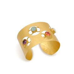 Made in NY The Eos Cuff is a shining sun right on your wrist. A thick hammered metal panel cuff where i have hand cutted the circles and bonded actines to give the Sun feeling & adorned with multi colored Austrian crystals. Available in Gold and Silver. Request your favorite crystal color. Platings: Gold : 18k electroplated gold Silver : Plated with pure silver and Oxidized to give an antique look.Crystal: High quality crystals.Please check the CRYSTAL COLOR GUIDE page for more color options.At Color Guide, Jewelry Care Instructions, Gold Bracelet Cuff, Hammered Metal, Metal Panels, Opal Bracelet, Austrian Crystal, Pure Silver, Jewelry Care