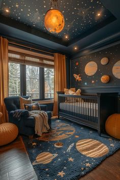 a baby's room with blue walls and stars on the ceiling