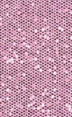 pink glitter fabric with small circles on it