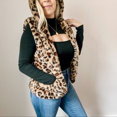 Faux Fur Leopard Print Vest. Tan, Brown & Black. Super Soft! Warm & Cozy. Open Vest With Front Pockets And Hood. Lined. Love Tree Nwt Never Worn, New Condition. Size Small Approximate Measurements... Pit To Pit Lying Flat: 19” Length: 25” Chic Cozy Boho Fun On Trend Holiday Gift Fall Festival Layering Wardrobe Winter Pumpkin Patch Bohemian Outerwear Fuzzy Furry Animal Print Vest Faux Fur Jacket Animal Print Vests, Cozy Boho, Hooded Vest, Love Tree, Fall Festival, Faux Fur Jacket, Fur Jacket, Coats Jackets Women, Pumpkin Patch