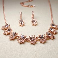 "A mix of clear and colored crystals decorate this exceptional set, complete with a stunning collar necklace and pair of drop earrings.  Fashioned in rose gold-tone mixed metal.  Approximate necklace length: 16\" + 3\" extender.  Approximate crystal drop: 1/2\".  Approximate earring drop: 1\". Original GIVENCHY box" Vintage Box, Crystal Drop, Mixed Metals, Color Crystal, Collar Necklace, Necklace Length, Earrings Set, Earring Set, Givenchy